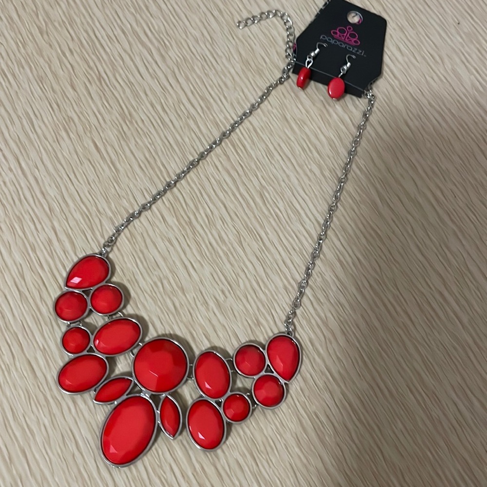 Red statement necklace with earrings